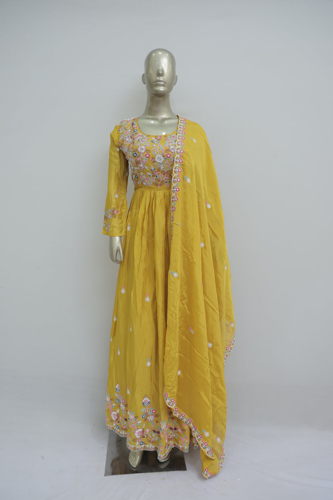 Bright yellow one piece with multicolour thread work