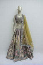 Load image into Gallery viewer, Stitched lehenga with top in raw silk fabric
