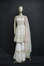 Load image into Gallery viewer, Gharara with peplum shirt in cream georgette

